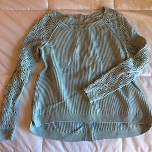 Button back sweater.